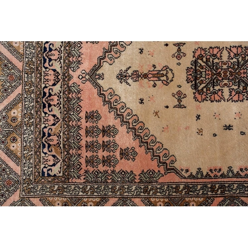 368 - A faded ivory ground Qum silk on silk rug, 20th century, with a central medallion and corners, 184 c... 