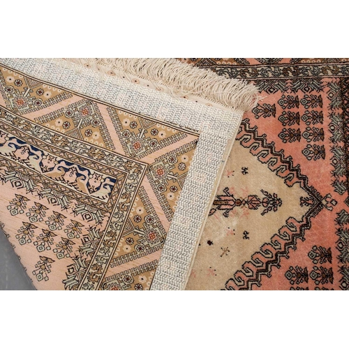 368 - A faded ivory ground Qum silk on silk rug, 20th century, with a central medallion and corners, 184 c... 