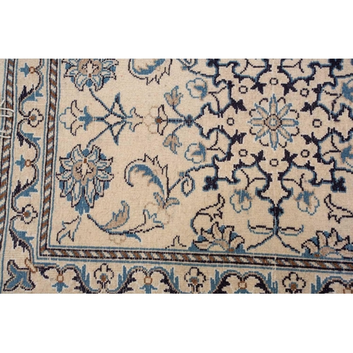 368 - A faded ivory ground Qum silk on silk rug, 20th century, with a central medallion and corners, 184 c... 