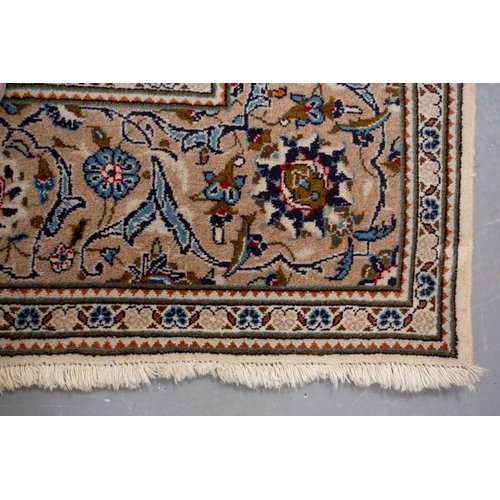 370 - A large Ivory ground Nain carpet with central medalion and hanging lanterns 304cm x 196cm