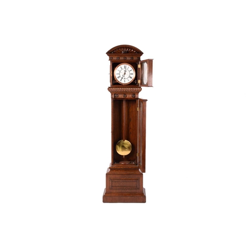 372 - An Austrian single-weight longcase regulator with white enamel Roman dial with a carved oak arched h... 