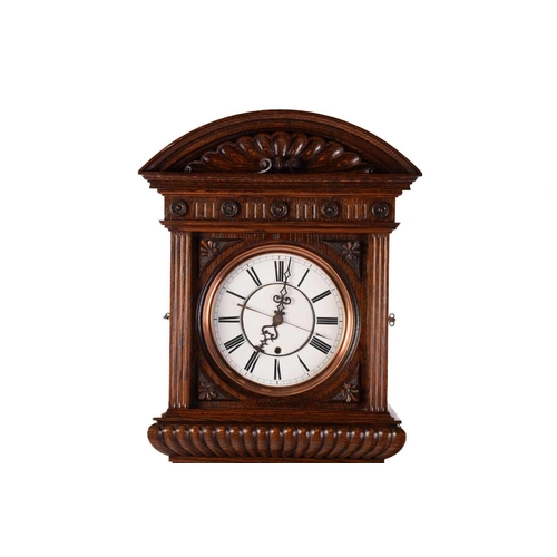 372 - An Austrian single-weight longcase regulator with white enamel Roman dial with a carved oak arched h... 