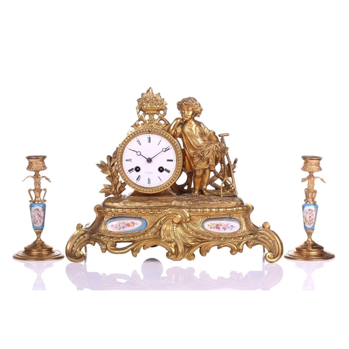 375 - A Henry Marc of Paris 8-day gilt mantel clock, late 19th century, with figural surmount emblematic o... 