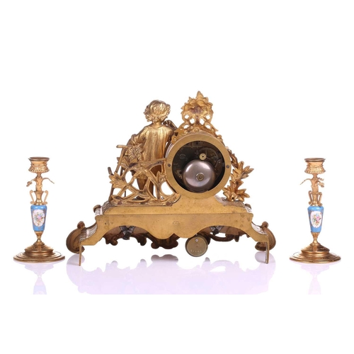 375 - A Henry Marc of Paris 8-day gilt mantel clock, late 19th century, with figural surmount emblematic o... 