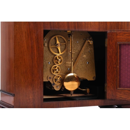 377 - A Victorian oak single fusee mantle timepiece with carved 