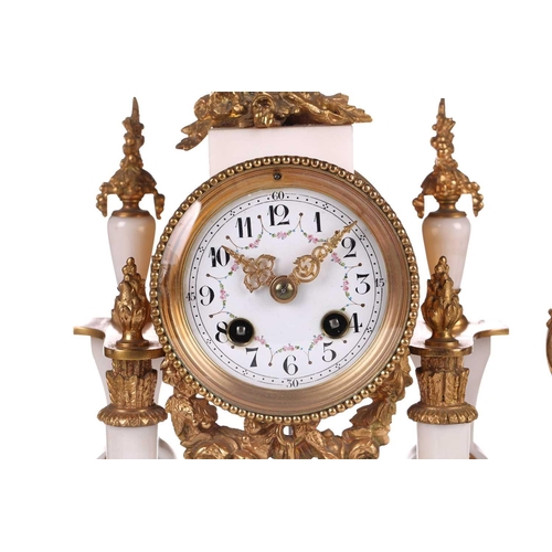 382 - A Louis XVI-style white marble and ormolu 8-day clock garniture, early 20th century, fitted with a s... 