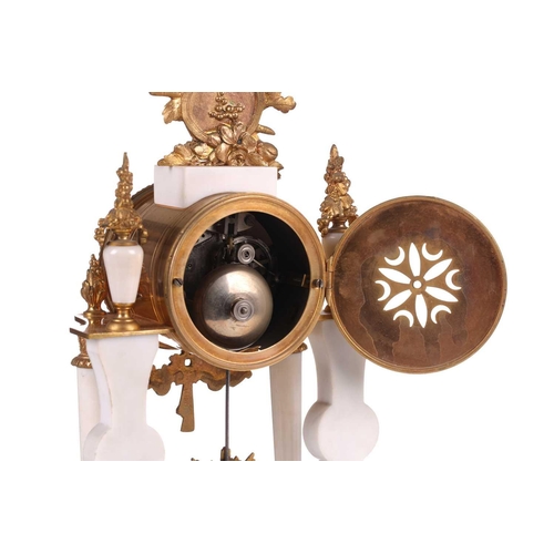 382 - A Louis XVI-style white marble and ormolu 8-day clock garniture, early 20th century, fitted with a s... 