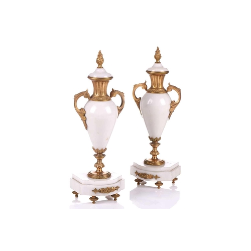 382 - A Louis XVI-style white marble and ormolu 8-day clock garniture, early 20th century, fitted with a s... 