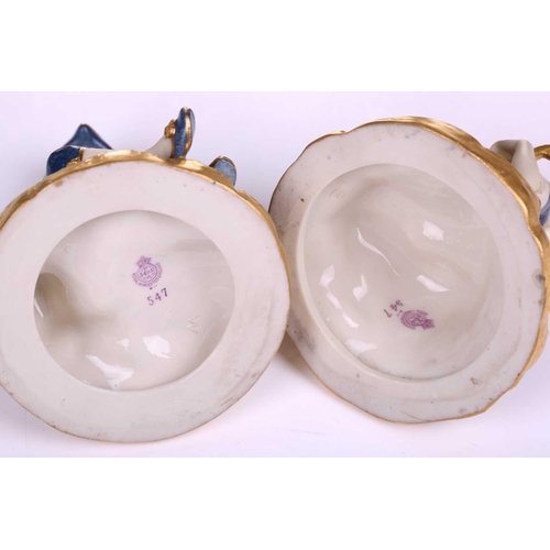 396 - A series of six Royal Worcester James Hadley blush gilt and powder blue porcelain figures involved i... 