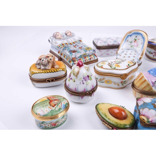 405 - A small collection of Limoges porcelain novelty trinket and pill boxes including boot form box with ... 