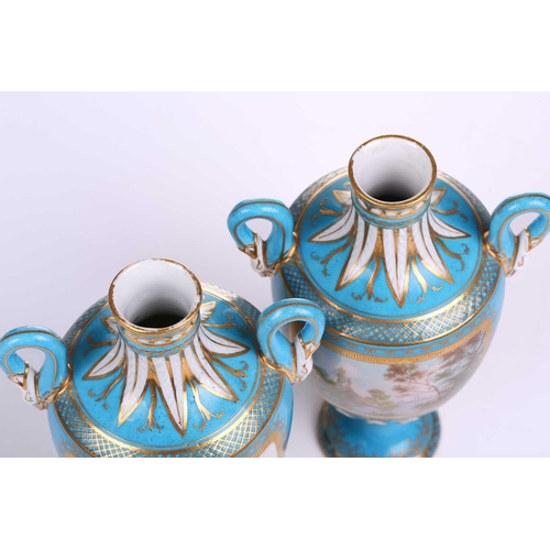 407 - A pair of small Sevres Bleu Celeste two-handled vases and covers,19th century, each painted with sce... 