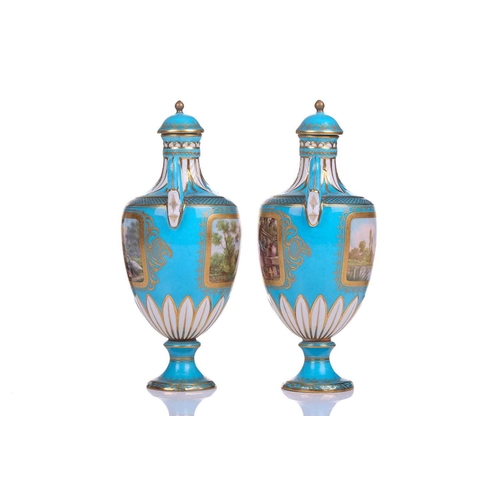 407 - A pair of small Sevres Bleu Celeste two-handled vases and covers,19th century, each painted with sce... 