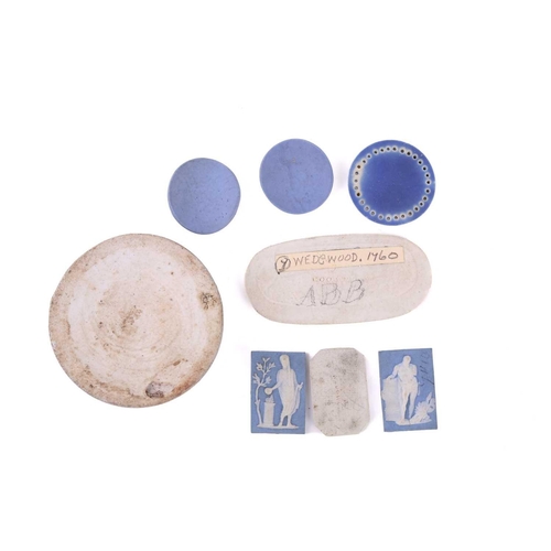 409 - A collection of eight miniature Wedgwood jasperware tablets, mid-18th century and later, the largest... 