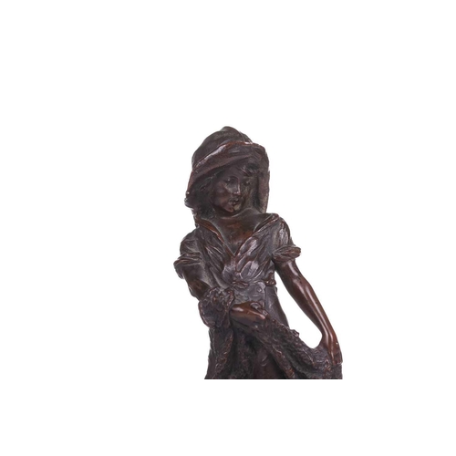 418 - A bronze figure of a young boy with a fishing net, 19th century, French, on a black marble pedestal,... 