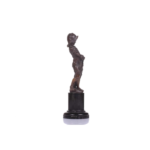 418 - A bronze figure of a young boy with a fishing net, 19th century, French, on a black marble pedestal,... 