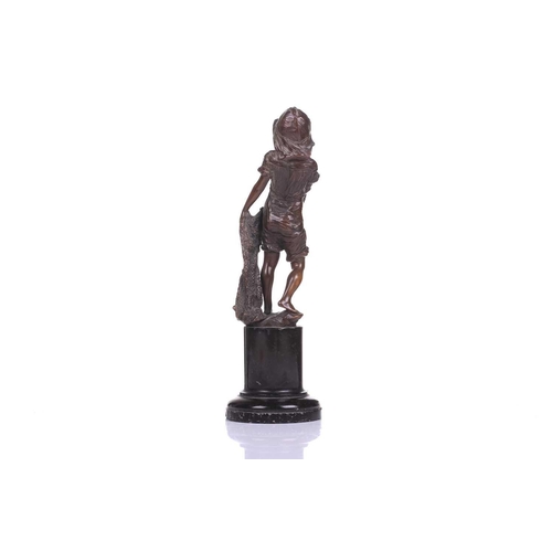 418 - A bronze figure of a young boy with a fishing net, 19th century, French, on a black marble pedestal,... 