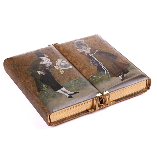 419 - A 19th-century Continental tooled leather bound double photograph album, the cover painted with a Da... 