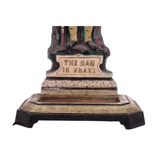 428 - A cast iron stick and umbrella stand, 'The Man in Khaki', 20th century, painted in polychrome enamel... 