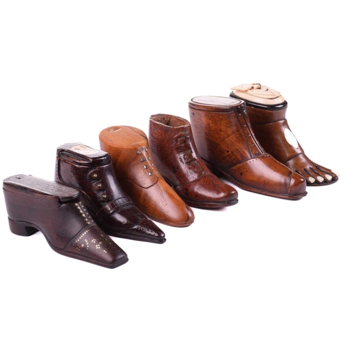 432 - A good collection of late 18th and 19th century treen snuff boxes, in the form of boots and shoes, i... 