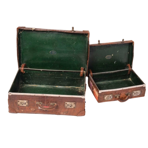 434 - A near pair of crocodile skin type leather suitcases, early 20th century, one with fitted interior, ... 