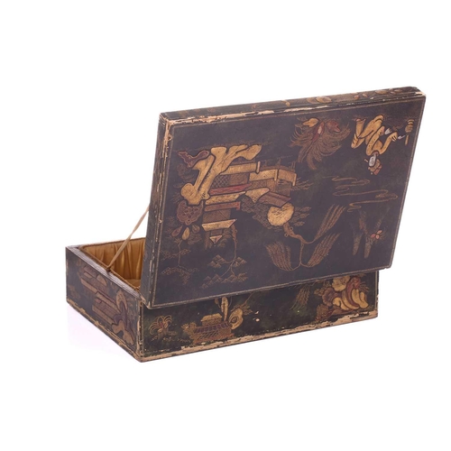 435 - A regency sewing box of casket form, green morocco decorated with brass appliques, on four lion paw ... 