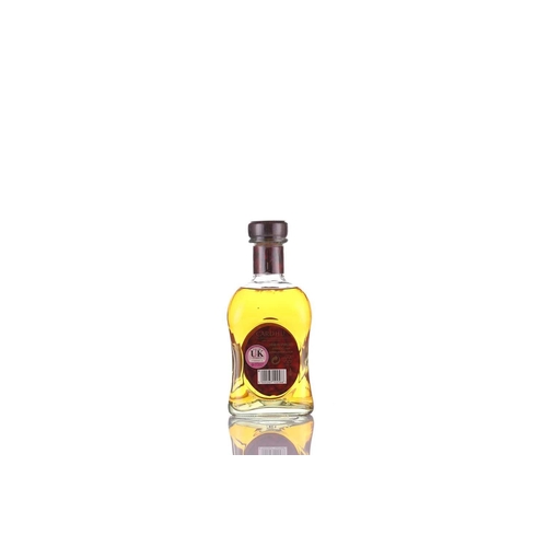 446 - A litre bottle of Johnnie Walker Gold Label Finest Scotch Whisky, Aged 18 Years, 43% Vol, together w... 