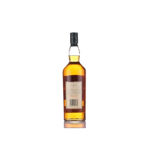 448 - A litre bottle of Laphroaig Single Islay Malt Scotch Whisky, 10 years old, 43% vol, together with a ... 