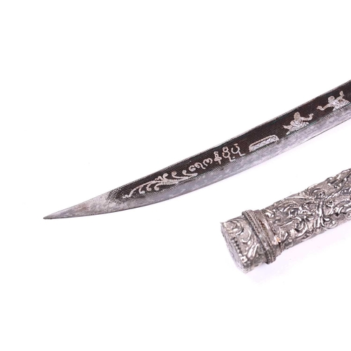 454 - A Thai white metal-mounted short sword with niello worked curving blade the hilt and scabbard of ova... 