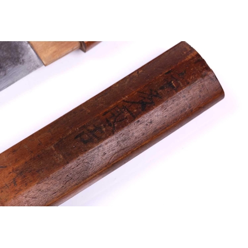 459 - A Japanese World War II Kamikaze-type tanto in simple beech wood mounts bearing a personal inscripti... 