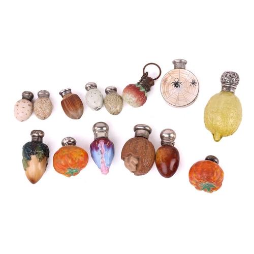 466 - A good collection of ceramic and glass novelty scent bottles, modelled as fruit, nuts and eggs, 19th... 