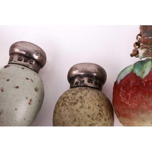 466 - A good collection of ceramic and glass novelty scent bottles, modelled as fruit, nuts and eggs, 19th... 