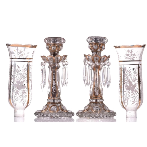 467 - A pair of Victorian glass storm lights, with white enamel floral decoration and gilt highlights, the... 