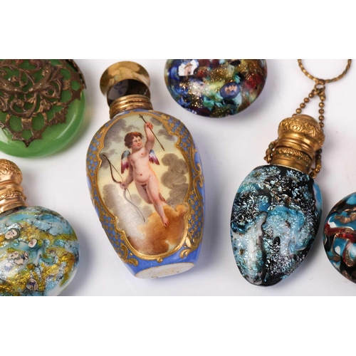 469 - A good collection of miniature Continental ceramic and Murano glass scent bottles, many with gilt mo... 