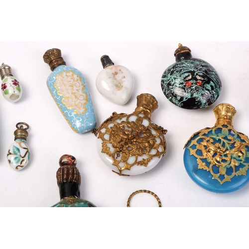 469 - A good collection of miniature Continental ceramic and Murano glass scent bottles, many with gilt mo... 