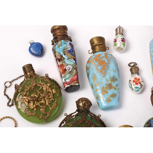 469 - A good collection of miniature Continental ceramic and Murano glass scent bottles, many with gilt mo... 