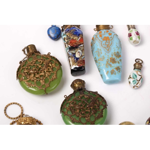 469 - A good collection of miniature Continental ceramic and Murano glass scent bottles, many with gilt mo... 