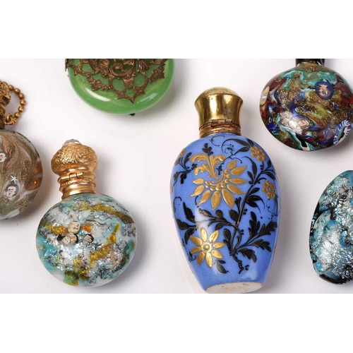 469 - A good collection of miniature Continental ceramic and Murano glass scent bottles, many with gilt mo... 