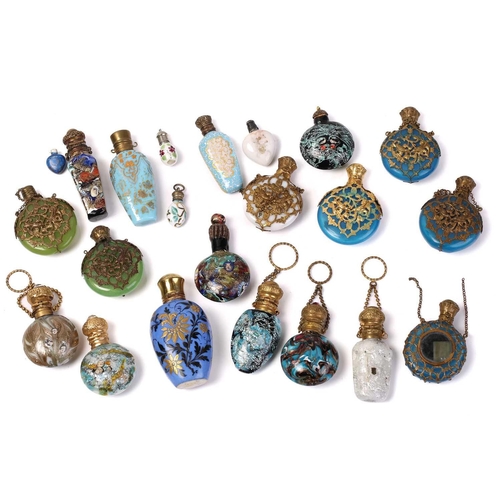 469 - A good collection of miniature Continental ceramic and Murano glass scent bottles, many with gilt mo... 