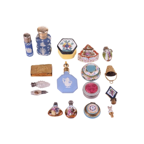 471 - A small collection of Victorian and later perfume bottles including a white metal capped Wedwood for... 