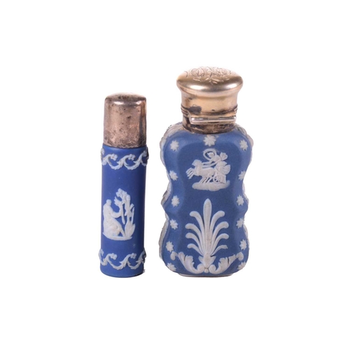 471 - A small collection of Victorian and later perfume bottles including a white metal capped Wedwood for... 