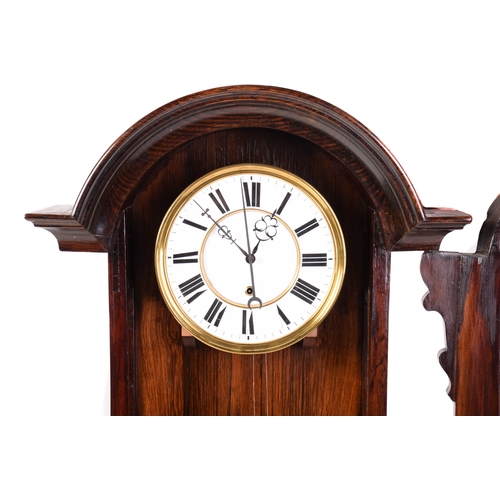 372A - An Austrian single-weight wall Vienna regulator with an arched top figured Indian rosewood case, wit... 