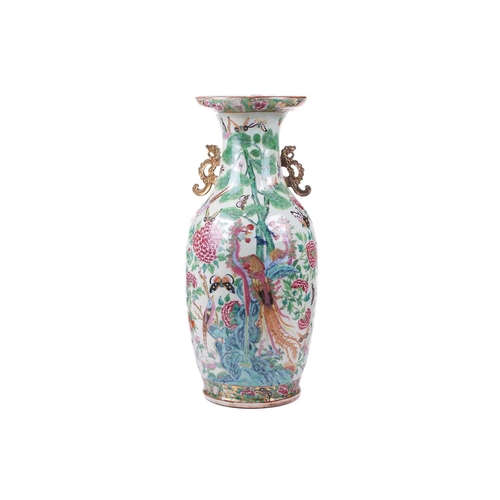 123 - A large Chinese Famile Rose baluster vase, Qing Dynasty, probably Daoguang, with stylized fungus han... 