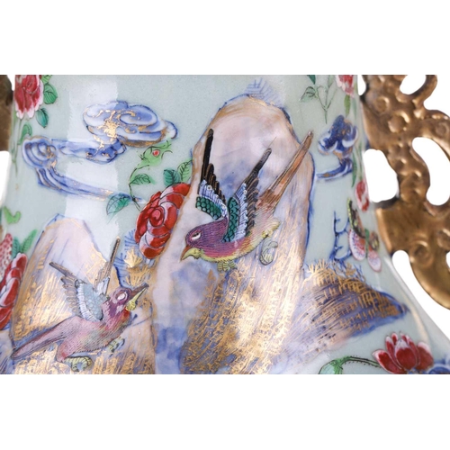 123 - A large Chinese Famile Rose baluster vase, Qing Dynasty, probably Daoguang, with stylized fungus han... 