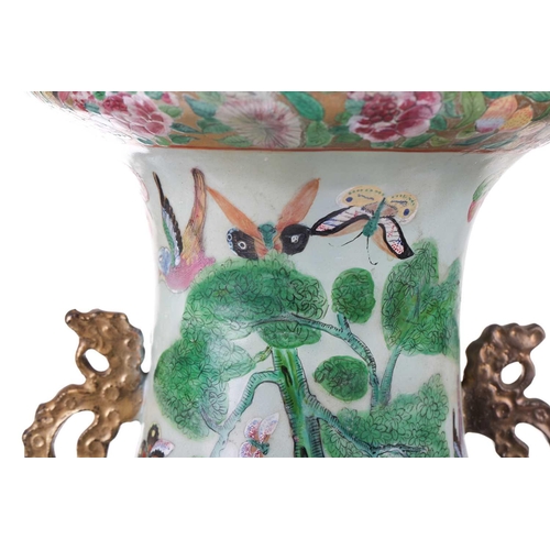 123 - A large Chinese Famile Rose baluster vase, Qing Dynasty, probably Daoguang, with stylized fungus han... 