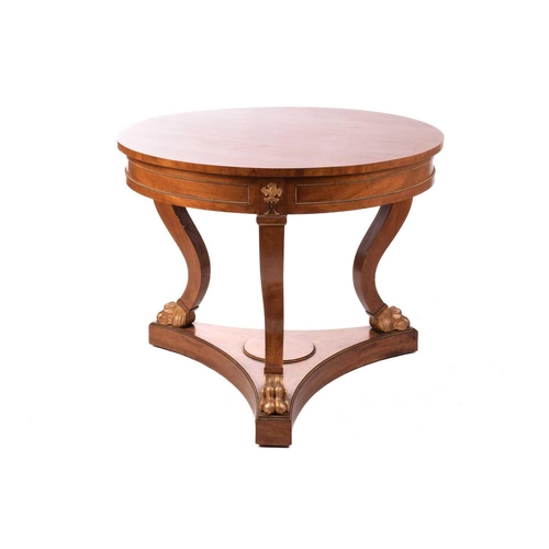 130 - A French Empire Style centre table, the circular top over a gilt beaded panelled frieze and flaming ... 