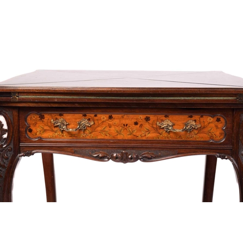135 - A late Victorian mahogany envelope card table, the shaped square top with satinwood crossbanding ove... 