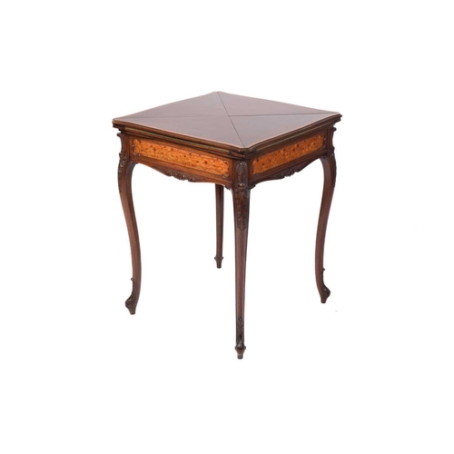 135 - A late Victorian mahogany envelope card table, the shaped square top with satinwood crossbanding ove... 