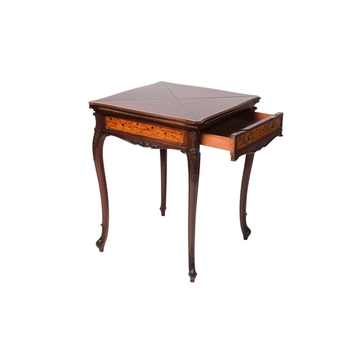 135 - A late Victorian mahogany envelope card table, the shaped square top with satinwood crossbanding ove... 