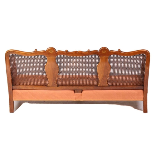 136 - An early 20th-century walnut and chinoiserie lacquer three-piece bergere lounge suite, probably 1920... 