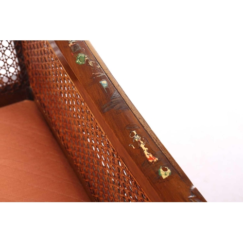 136 - An early 20th-century walnut and chinoiserie lacquer three-piece bergere lounge suite, probably 1920... 